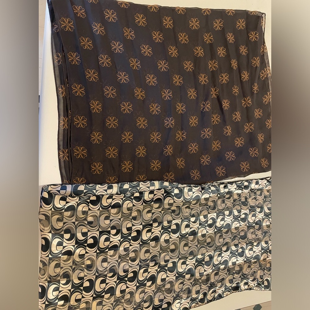 A set of two beautiful scarves.